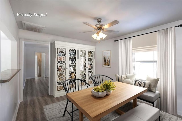 1129 US Highway 50, Centerview, MO 64019 - dining space featuring ceiling fan and wood finished floors