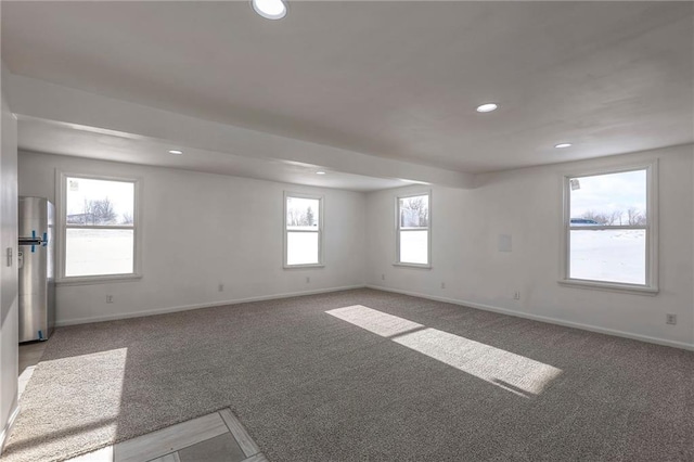 1129 US Highway 50, Centerview, MO 64019 - carpeted empty room with recessed lighting