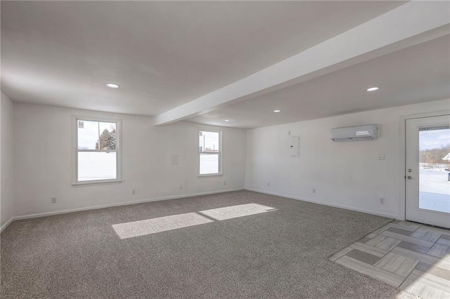 1129 US Highway 50, Centerview, MO 64019 - spare room with a wall unit AC, light colored carpet, and recessed lighting