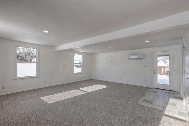 1129 US Highway 50, Centerview, MO 64019 - spare room with a wall mounted air conditioner, light colored carpet, and recessed lighting
