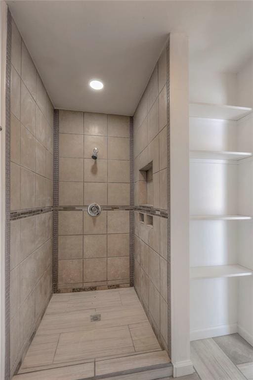 1129 US Highway 50, Centerview, MO 64019 - bathroom featuring a tile shower and recessed lighting