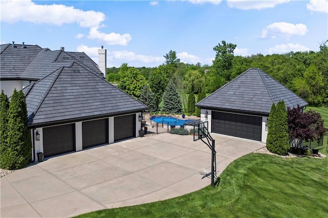 20711 Benson St, Bucyrus, KS 66013 - detached garage featuring an outdoor pool