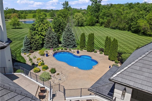 20711 Benson St, Bucyrus, KS 66013 - view of pool featuring a water view and a patio area