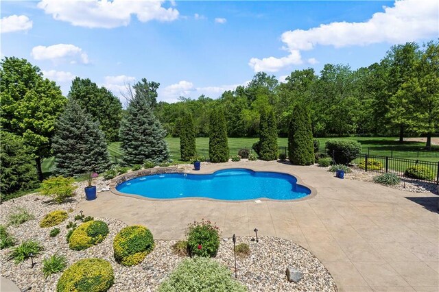 20711 Benson St, Bucyrus, KS 66013 - view of pool featuring a patio