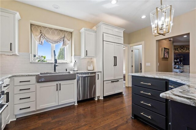20711 Benson St, Bucyrus, KS 66013 - kitchen with dishwasher, white cabinetry, decorative backsplash, a chandelier, and recessed lighting