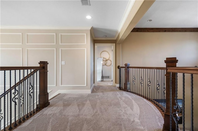20711 Benson St, Bucyrus, KS 66013 - hall with crown molding, an upstairs landing, carpet, a decorative wall, and recessed lighting