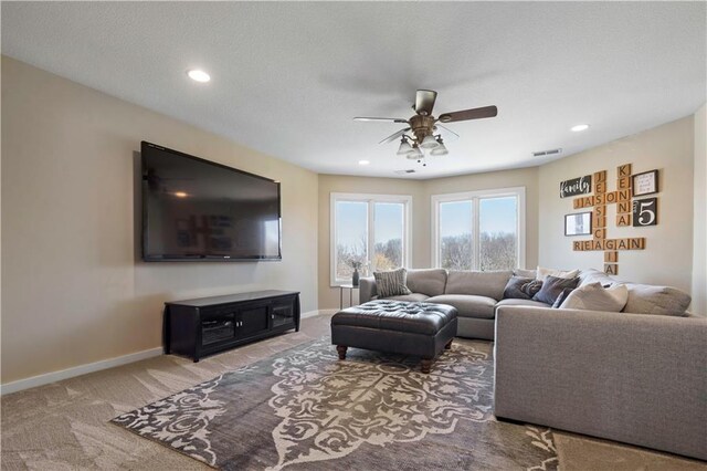 20711 Benson St, Bucyrus, KS 66013 - living area with ceiling fan, carpet, and recessed lighting