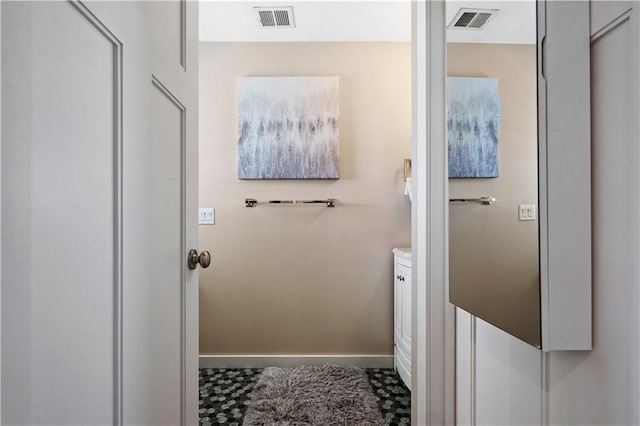 20711 Benson St, Bucyrus, KS 66013 - bathroom featuring baseboards and vanity