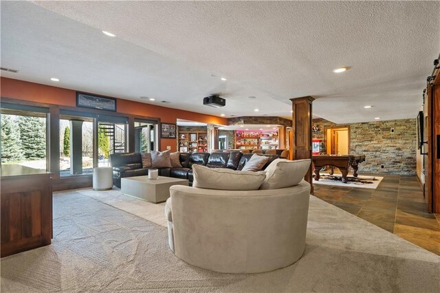 20711 Benson St, Bucyrus, KS 66013 - living room with ornate columns, a textured ceiling, recessed lighting, bar, and billiards