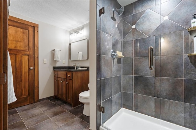 20711 Benson St, Bucyrus, KS 66013 - bathroom with a shower stall, vanity, tile patterned floors, and a textured ceiling