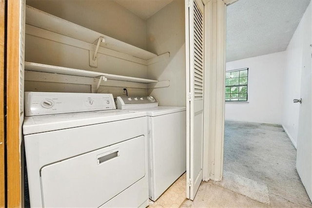 11431 Reeder St, Overland Park, KS 66210 - laundry room with separate washer and dryer, light colored carpet, and baseboards