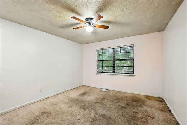 11431 Reeder St, Overland Park, KS 66210 - empty room featuring carpet, ceiling fan, a textured ceiling, and baseboards