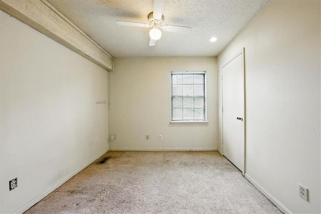 11431 Reeder St, Overland Park, KS 66210 - carpeted spare room featuring a ceiling fan, a textured ceiling, and baseboards