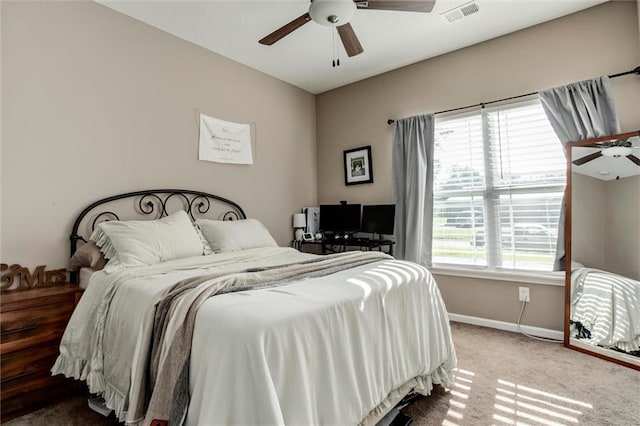 128 S Poplar St, Ottawa, KS 66067 - bedroom featuring carpet, baseboards, and a ceiling fan