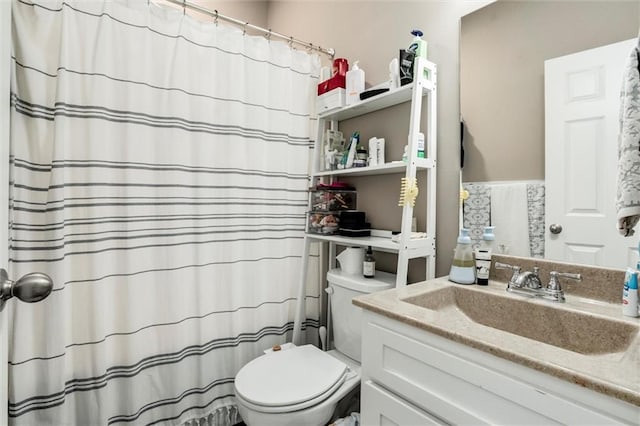 128 S Poplar St, Ottawa, KS 66067 - full bath with toilet, vanity, and curtained shower
