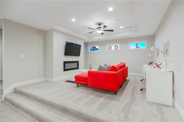 12507 W 183rd Ter, Overland Park, KS 66013 - living room featuring carpet floors, a raised ceiling, baseboards, recessed lighting, and ceiling fan