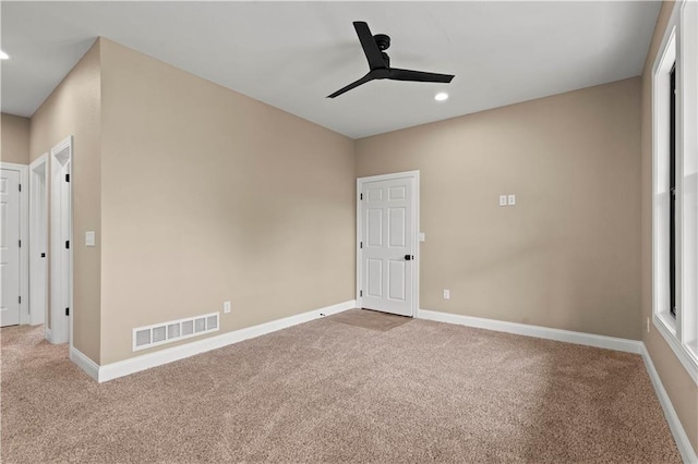 26696 235th St, Mclouth, KS 66054 - spare room featuring carpet floors, a ceiling fan, baseboards, and recessed lighting