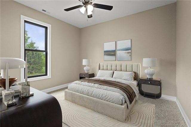 26696 235th St, Mclouth, KS 66054 - carpeted bedroom with baseboards and a ceiling fan