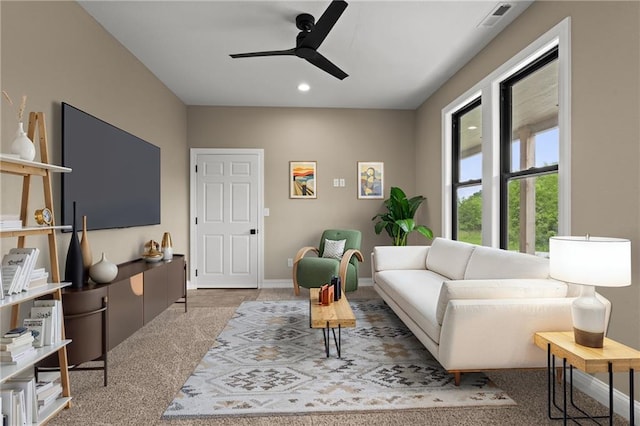 26696 235th St, Mclouth, KS 66054 - carpeted living area featuring a ceiling fan, baseboards, and recessed lighting