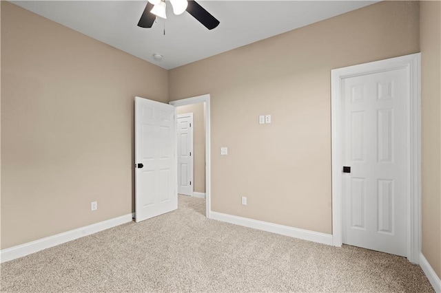 26696 235th St, Mclouth, KS 66054 - unfurnished bedroom with carpet floors, baseboards, and a ceiling fan
