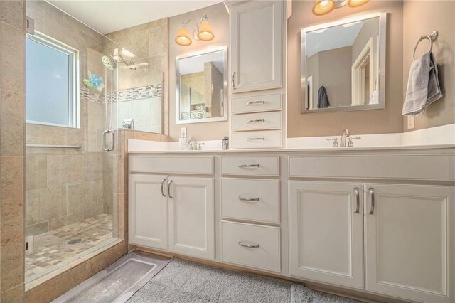 13511 W 56th Ter, Shawnee, KS 66216 - bathroom with a stall shower and double vanity
