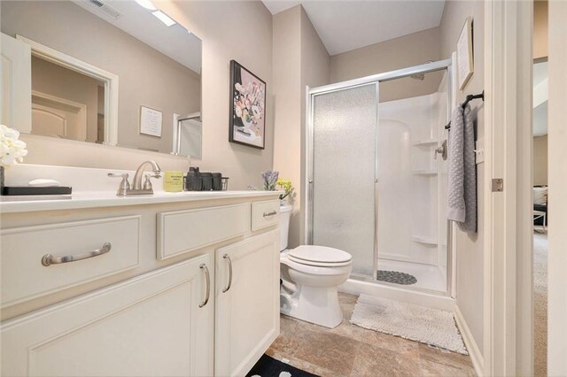 13511 W 56th Ter, Shawnee, KS 66216 - full bathroom featuring a shower stall, vanity, and stone finish flooring