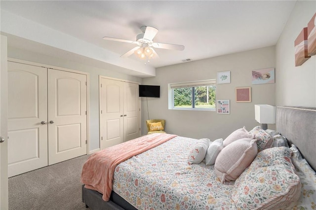 13511 W 56th Ter, Shawnee, KS 66216 - bedroom featuring two closets, carpet floors, and ceiling fan