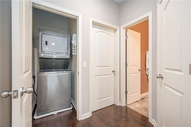 13511 W 56th Ter, Shawnee, KS 66216 - laundry room with stacked washer / dryer and dark wood-style floors