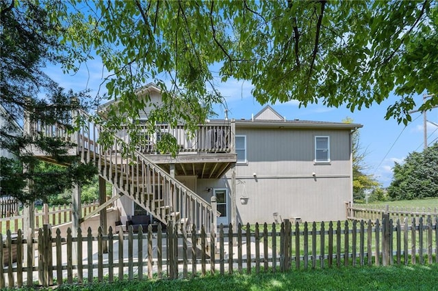 13511 W 56th Ter, Shawnee, KS 66216 - rear view of house with a patio, stairway, a fenced backyard, and a wooden deck