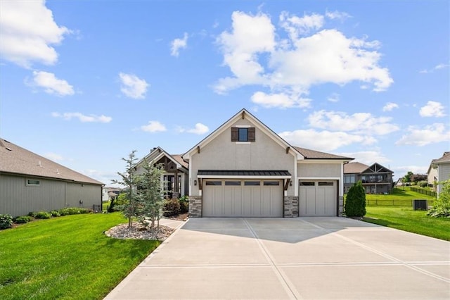3053 NW Thoreau Ln, Lees Summit, MO 64081 - view of front of house with stucco siding, a front lawn, stone siding, and driveway
