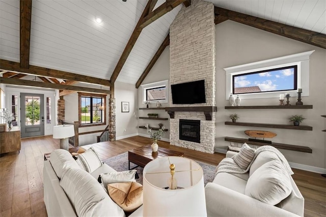 3053 NW Thoreau Ln, Lees Summit, MO 64081 - living area featuring wood-type flooring, a fireplace, and wooden ceiling