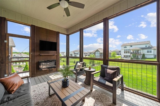 3053 NW Thoreau Ln, Lees Summit, MO 64081 - sunroom featuring a residential view and a ceiling fan