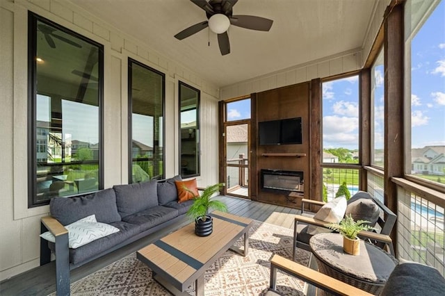 3053 NW Thoreau Ln, Lees Summit, MO 64081 - sunroom / solarium featuring outdoor lounge area and ceiling fan