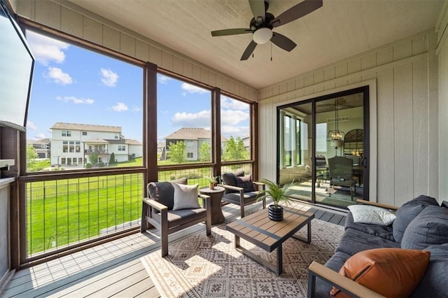 3053 NW Thoreau Ln, Lees Summit, MO 64081 - sunroom with an outdoor living space, a ceiling fan, and a residential view
