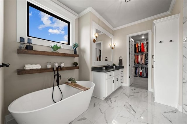 3053 NW Thoreau Ln, Lees Summit, MO 64081 - full bathroom featuring a soaking tub, vanity, a spacious closet, crown molding, and marble finish floors