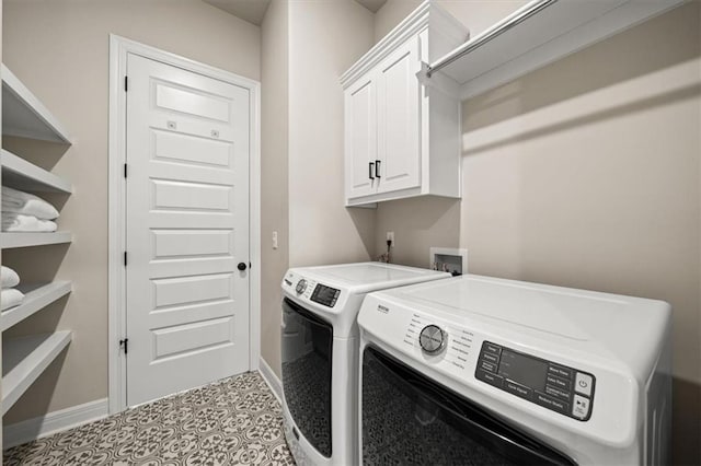 3053 NW Thoreau Ln, Lees Summit, MO 64081 - laundry room featuring washing machine and clothes dryer and cabinet space