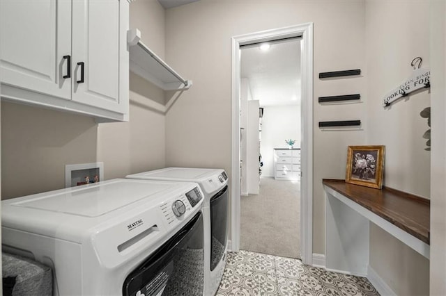 3053 NW Thoreau Ln, Lees Summit, MO 64081 - laundry area with cabinet space, washer and clothes dryer, and light colored carpet