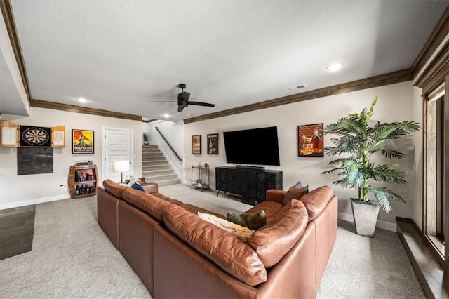 3053 NW Thoreau Ln, Lees Summit, MO 64081 - living room featuring recessed lighting, stairs, ornamental molding, ceiling fan, and a textured ceiling