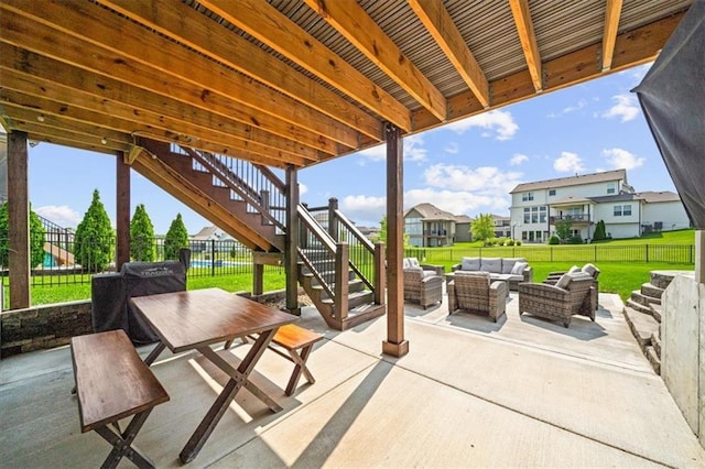 3053 NW Thoreau Ln, Lees Summit, MO 64081 - fenced backyard featuring outdoor lounge area, stairway, a patio, a residential view, and outdoor dining area