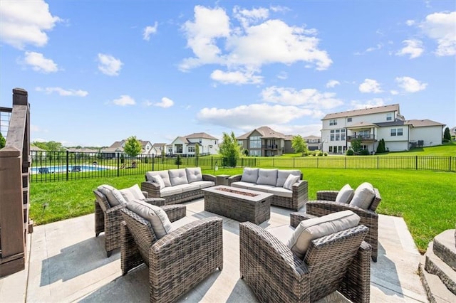 3053 NW Thoreau Ln, Lees Summit, MO 64081 - fenced backyard with an outdoor living space with a fire pit, a residential view, and a patio