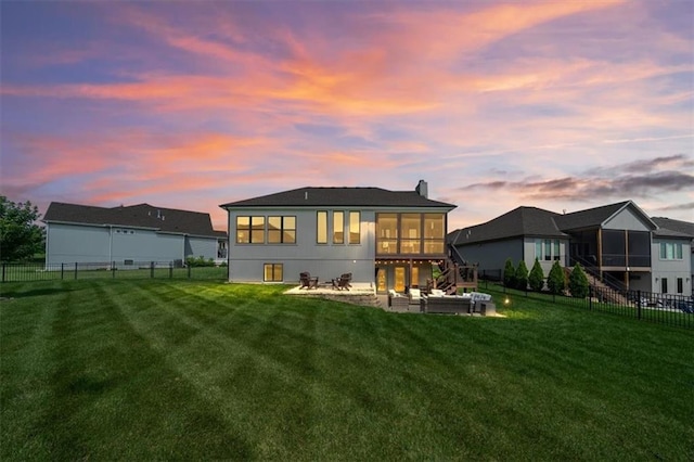 3053 NW Thoreau Ln, Lees Summit, MO 64081 - back of property featuring a sunroom, a fenced backyard, stairs, and a patio area