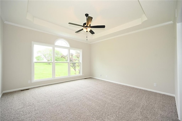 18 Timber Creek Cir, Platte City, MO 64079 - unfurnished room featuring a raised ceiling, carpet, baseboards, a ceiling fan, and crown molding