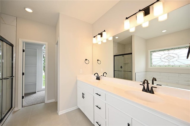 18 Timber Creek Cir, Platte City, MO 64079 - bathroom featuring a shower stall, double vanity, tile patterned floors, baseboards, and a tub to relax in
