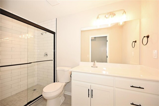 18 Timber Creek Cir, Platte City, MO 64079 - bathroom with toilet, a shower stall, vanity, and tile patterned floors