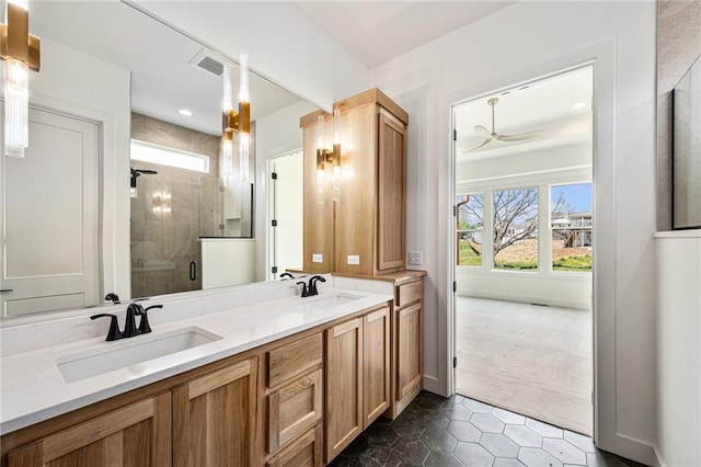 12445 Empress St, Platte City, MO 64079 - full bathroom with a shower stall, double vanity, and tile patterned flooring