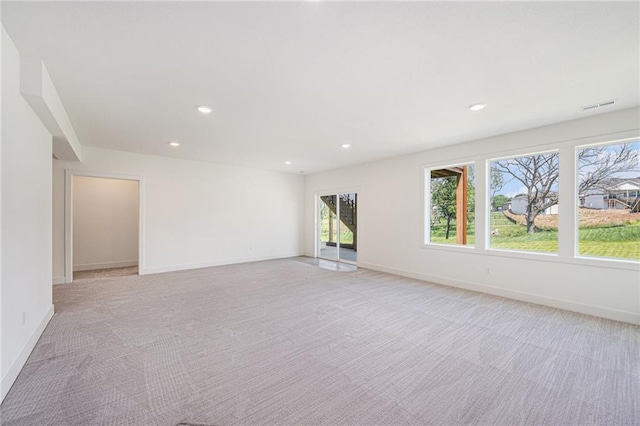 12445 Empress St, Platte City, MO 64079 - spare room featuring light carpet, recessed lighting, and baseboards