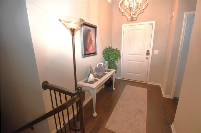 2015 Creek View Ln, Raymore, MO 64083 - foyer with a chandelier and wood finished floors