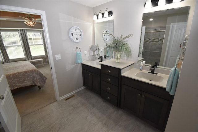 2015 Creek View Ln, Raymore, MO 64083 - full bath with double vanity, a stall shower, and ensuite bath
