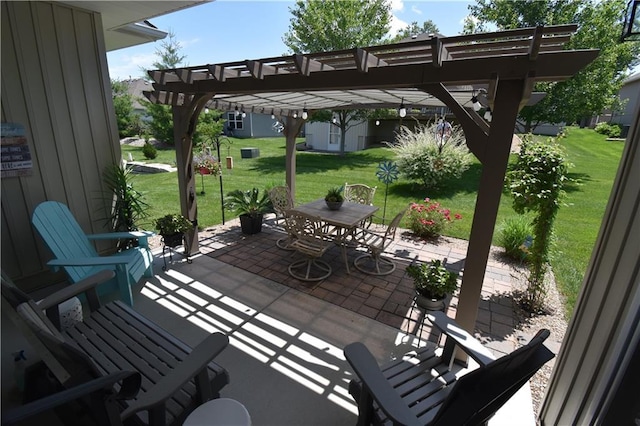2015 Creek View Ln, Raymore, MO 64083 - view of patio / terrace with a pergola, outdoor dining space, and an outdoor structure