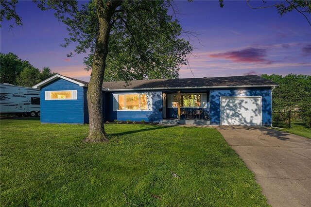 624 S Locust St, Gardner, KS 66030 - ranch-style home featuring an attached garage, a yard, and driveway